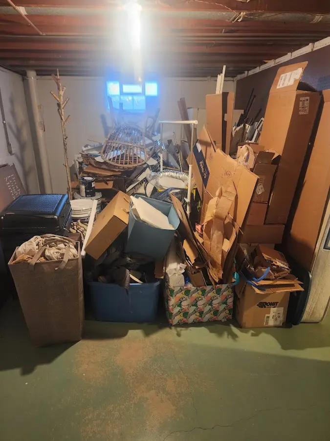 Roll-off dumpster container at job site for 20 Yard Dumpster Rental in Jemison